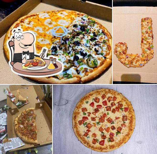 Try out pizza at Pizza Zone Classic Pizzeria