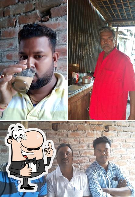 Look at this photo of Montu Da Tea Stall