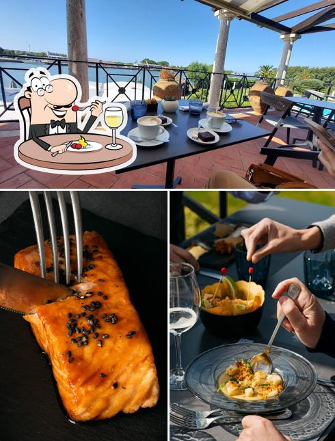 PRIMOPIANO Aperitivo&Cucina by Porto Romano si caratterizza per la cibo e interni