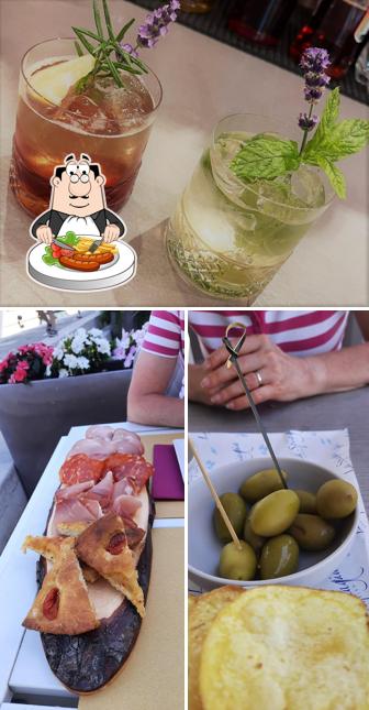 Questa è la immagine che raffigura la cibo e alcol di Drink & Pizza