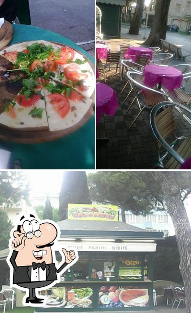 Questa è la foto che presenta la interni e pizza di Il Barachino piadineria Riccione