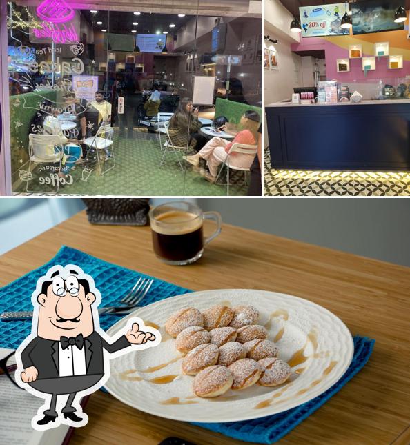 The interior of 99 Pancakes in Thane panchpakhadi - Mini Pancakes, Waffles, Cakes, Pastries & more