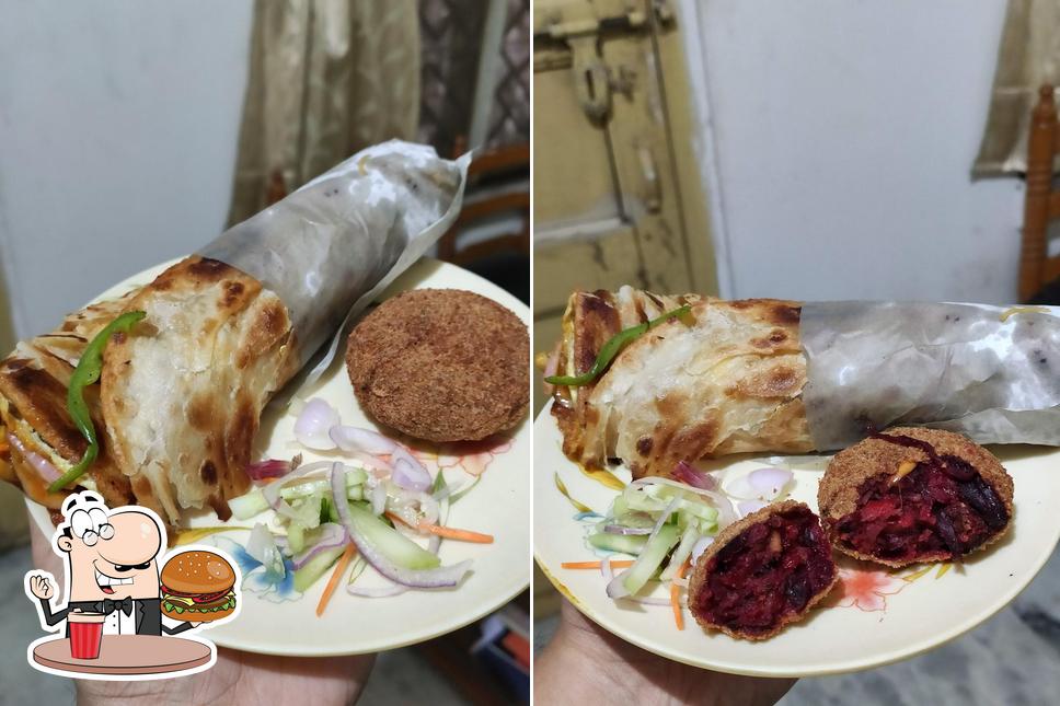 Order a burger at Rabi Restaurant