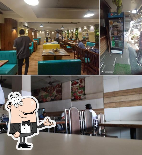 The interior of Radha Krishna Pure Veg Hotel