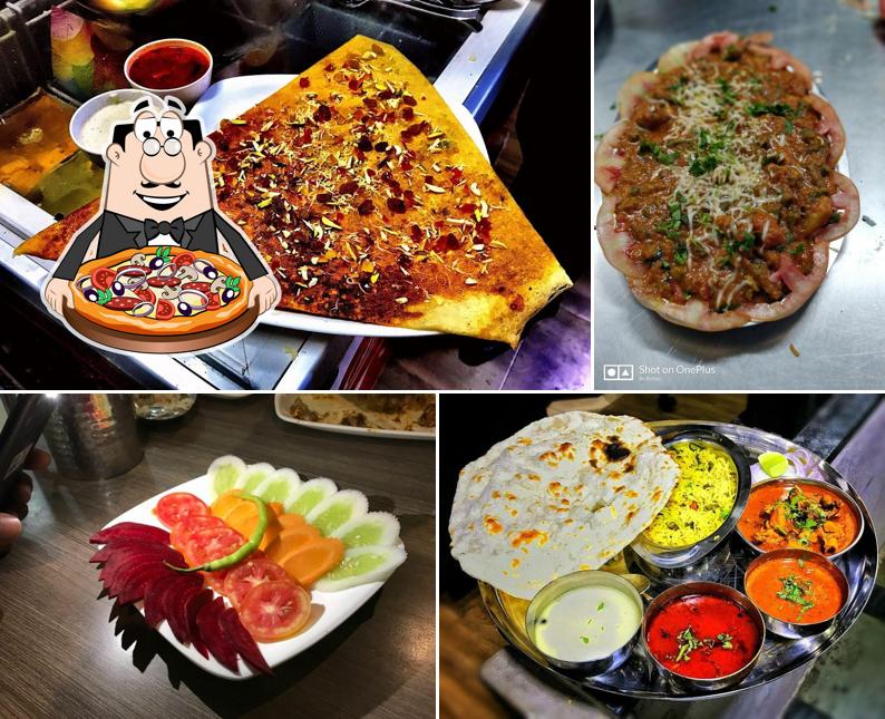 Try out pizza at Hotel Seasons Cafe & Resto