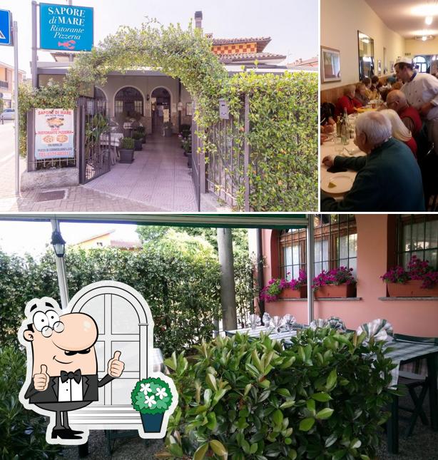 Guarda gli esterni di Ristorante Pizzeria Sapore di Mare con Tavoli Giardino