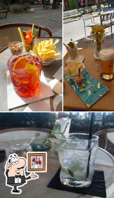 Tra le diverse cose da American Charlie's Bar si possono trovare la interni e tavolo da pranzo