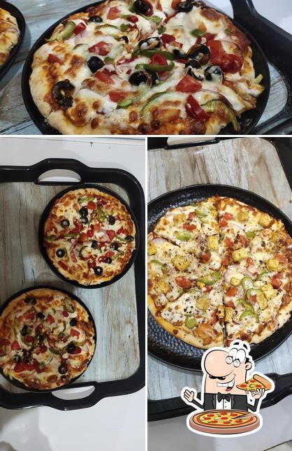 Get pizza at CRISPY CAFE