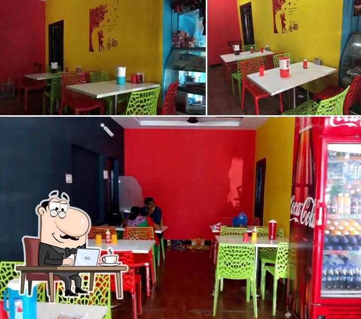 Take a seat at one of the tables at Biryani Zone
