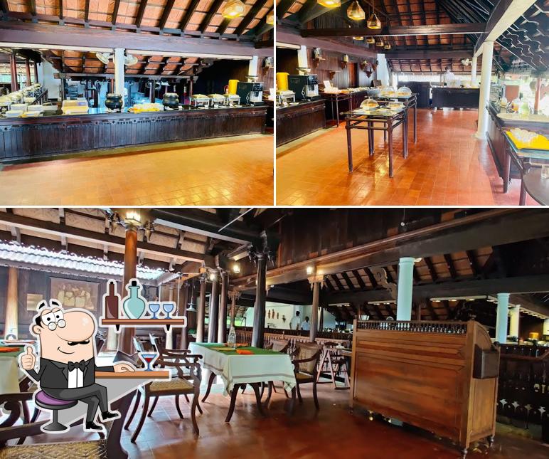 Check out how Ettukettu Specialty Restaurant - Kumarakom Lake Resort looks inside