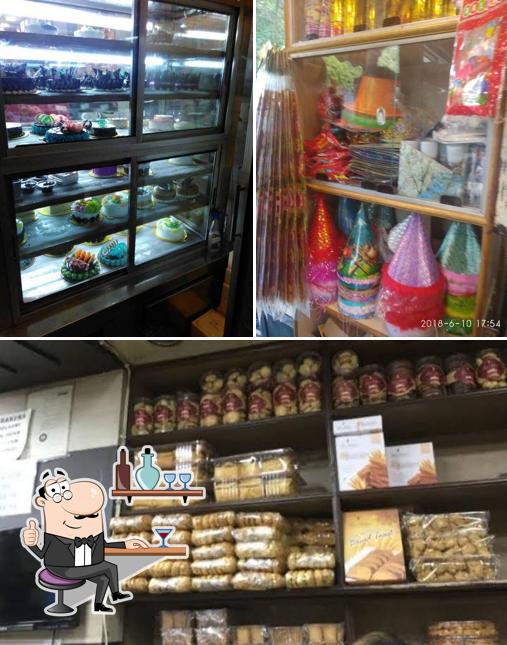 This is the photo displaying interior and blackboard at Puri Bakers