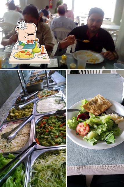A ilustração do Franciscano Restaurante’s comida e mesa de jantar