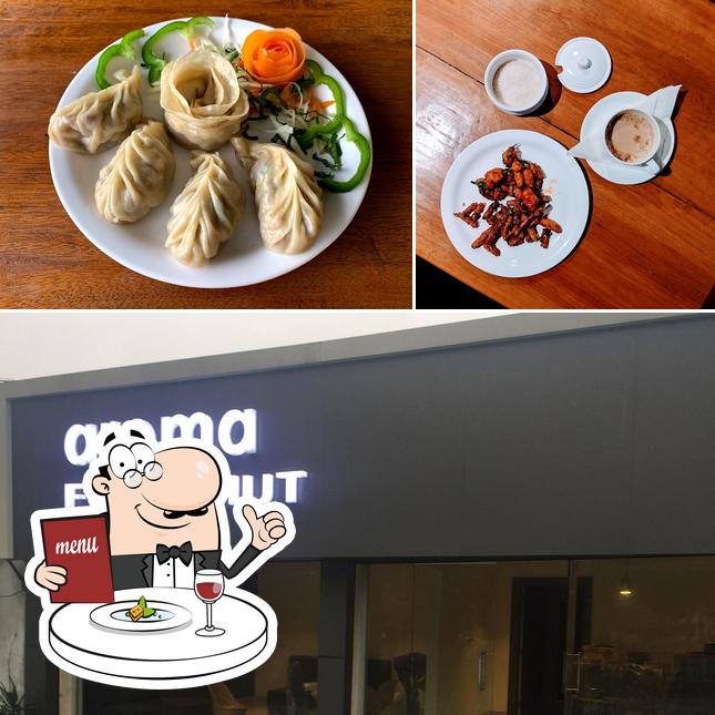 This is the picture showing food and interior at Aroma food hut