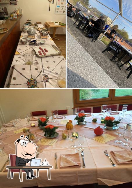 Dai un’occhiata alla immagine che mostra la interni e tavolo da pranzo di Tennis Club