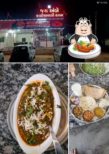 This is the photo displaying food and exterior at Jay Ambe dhaba