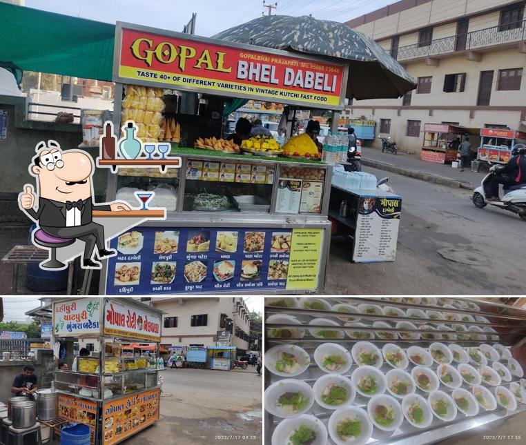 Take a look at the photo showing interior and food at Gopal roti Wala