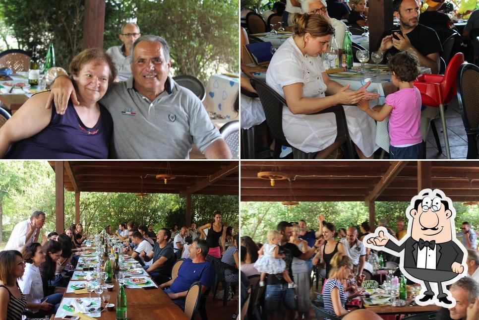 La foto della interni e tavolo da pranzo di Ristorante Dalinda