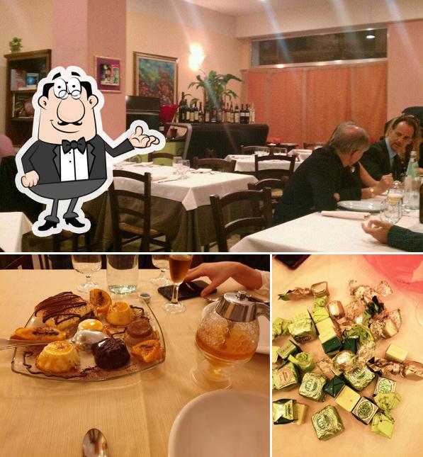 Dai un'occhiata agli interni di Ago's Pizza