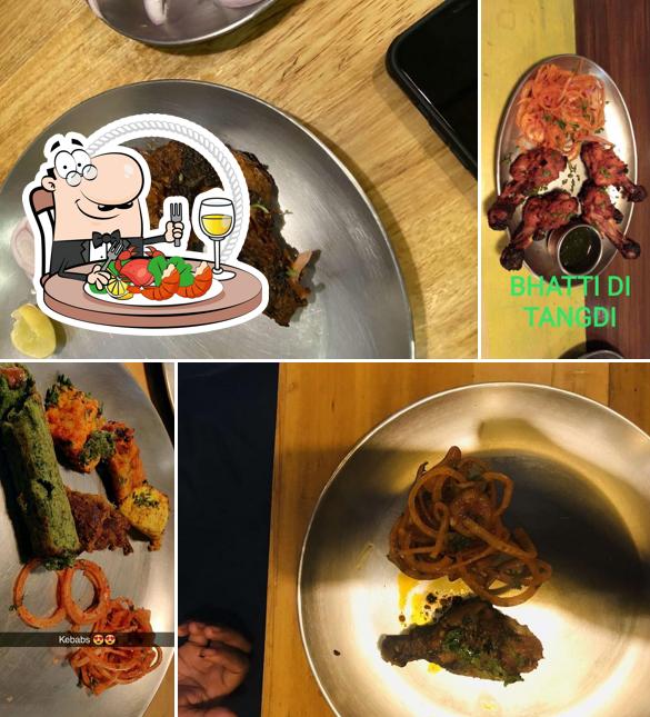 Get different seafood dishes available at Dhaba Estd 1986