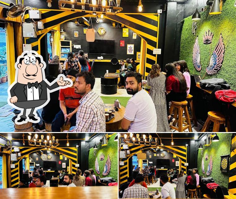 Take a seat at one of the tables at Gup shup cafe tikamgarh
