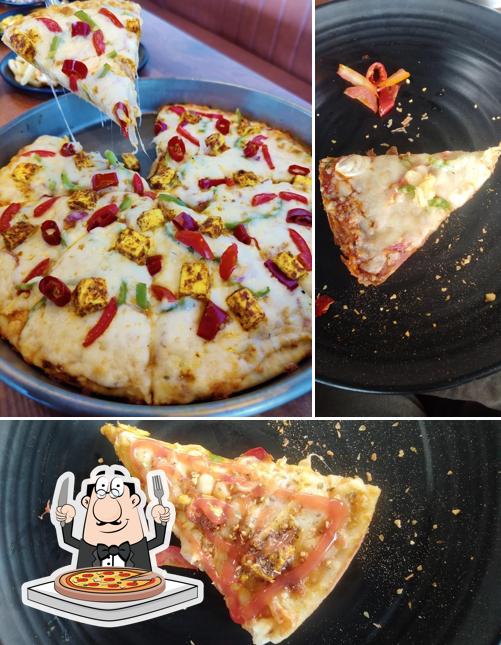 Get pizza at British Pizza Mehsana