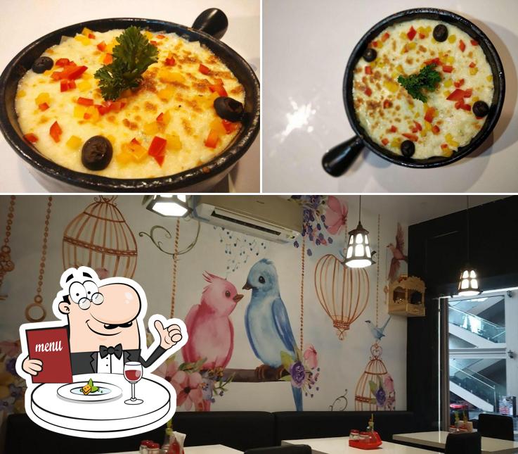 The photo of food and interior at The One Cafe