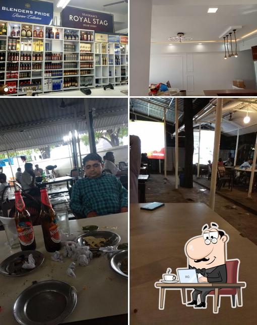 Take a seat at one of the tables at GBR - Girish Bar & Restaurant