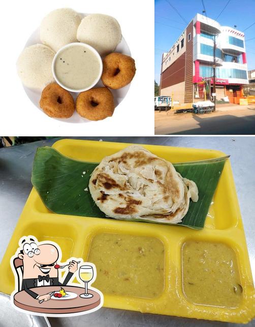 The photo of food and exterior at Hotel Manasa