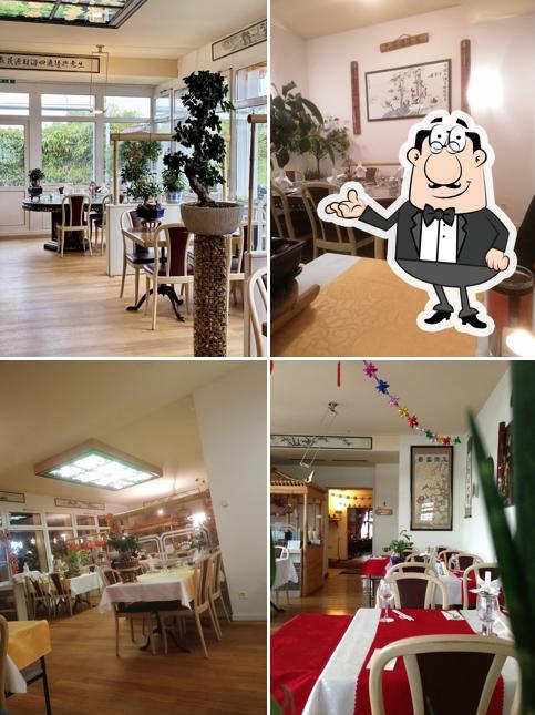 Siediti a un tavolo di Landhaus Bambusgarten