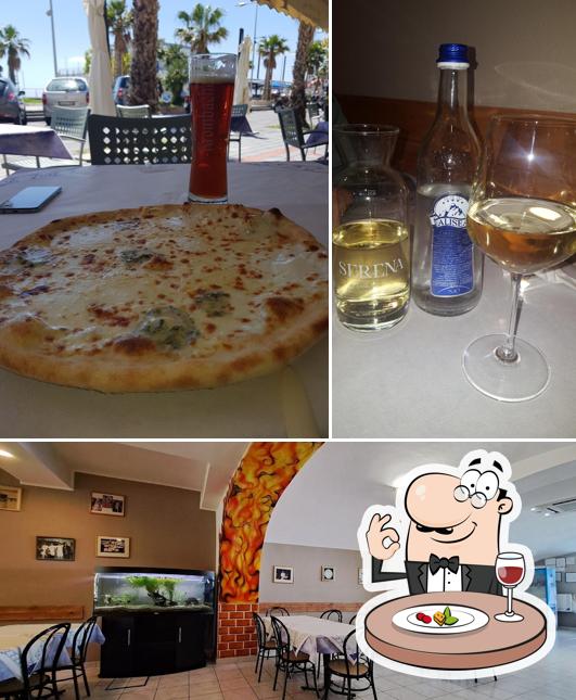 Tra le varie cose da Pizzeria da Rino mare si possono trovare la cibo e interni