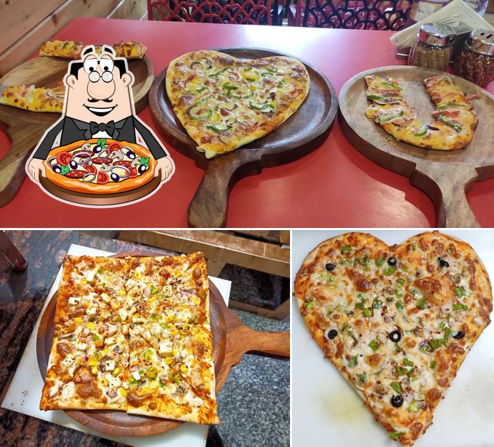 Pick pizza at Prem Cafe & Restaurant