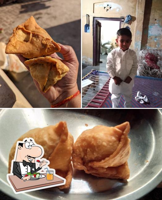 This is the image showing food and interior at Dhara Halwai