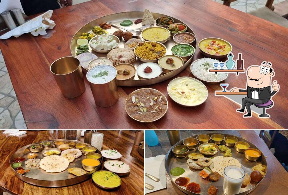 The photo of interior and food at Revival Indian Thali