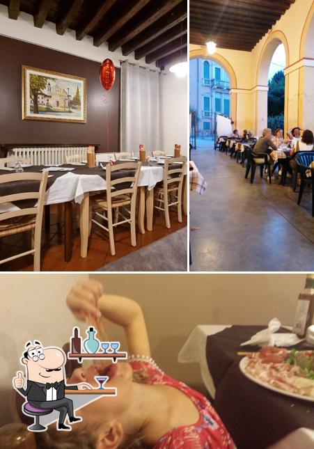Siediti a un tavolo di Bar Pizzeria Al Parco