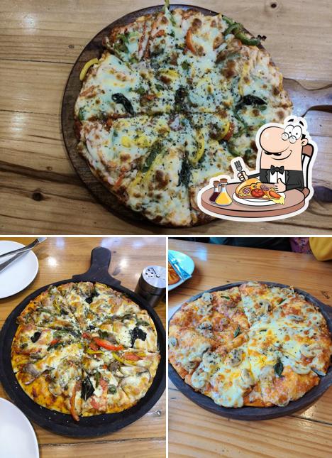 Pick pizza at Dana Coffee House and German Bakery