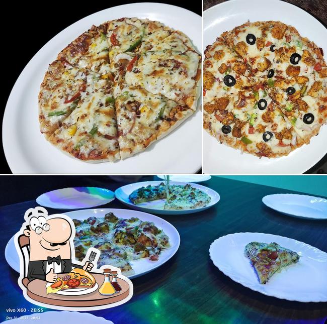 Get pizza at HOTEL KISABU
