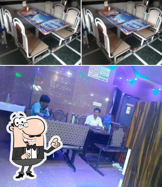 The interior of Hotel Pooja Bar And Restaurant