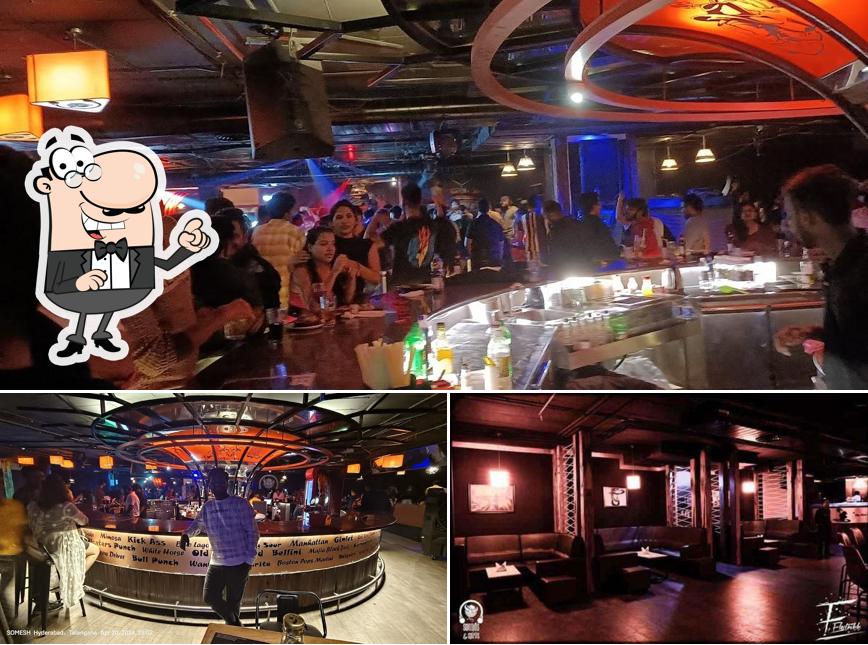 Take a seat at one of the tables at Sounds & Spirits - Best Night Club