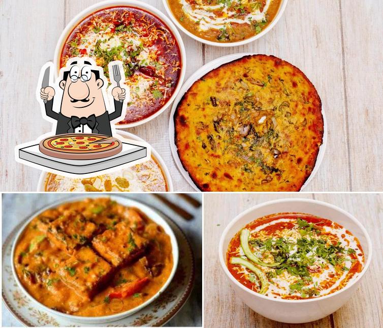 Try out pizza at Om Restaurant