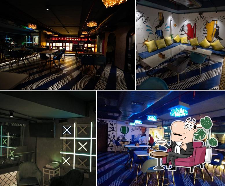 Take a seat at one of the tables at Tamm Jham