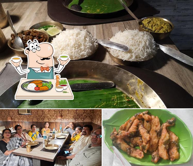 The image of food and dining table at Kasturi Restaurant