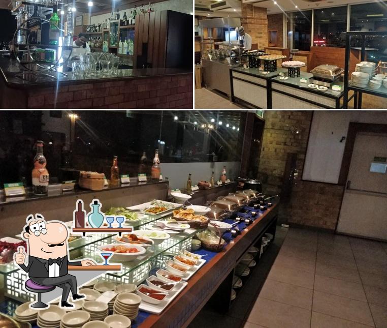 Take a seat at one of the tables at Barbeque Nation