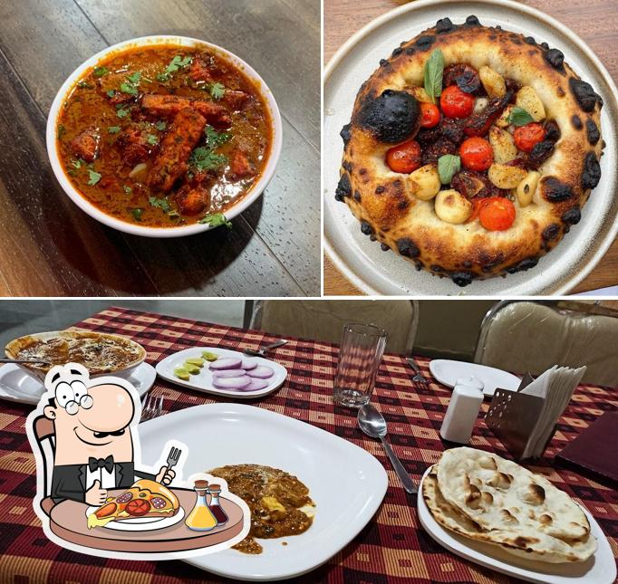 Order pizza at Hotel Vedant - Pure Veg Restaurant