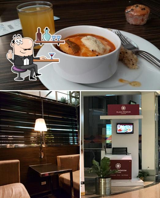 Among various things one can find interior and food at Plaza Premium Lounge