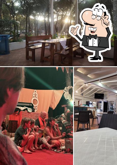 La immagine della interni e tavolo da pranzo di Bar Ristorante la Mandragola