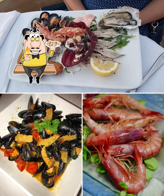 Ordina tra i molti prodotti di cucina di mare disponibili a Gabbiano Beach - Restaurant