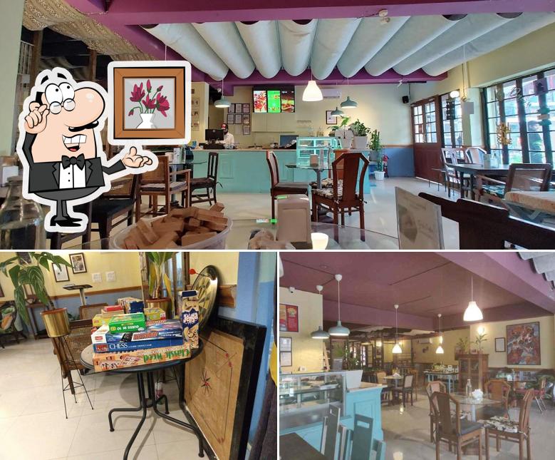 Take a seat at one of the tables at Cuppa Redefined - HSR Layout's Neighbourhood Cafe & Restaurant
