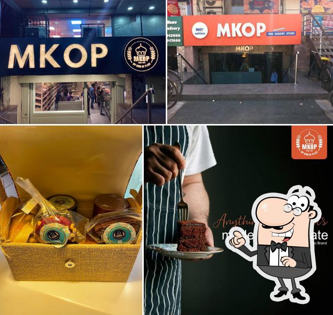 Check out how MKOP- The Exclusive Bakery Store Sanjay Place Cakes, Bakes and More! looks outside