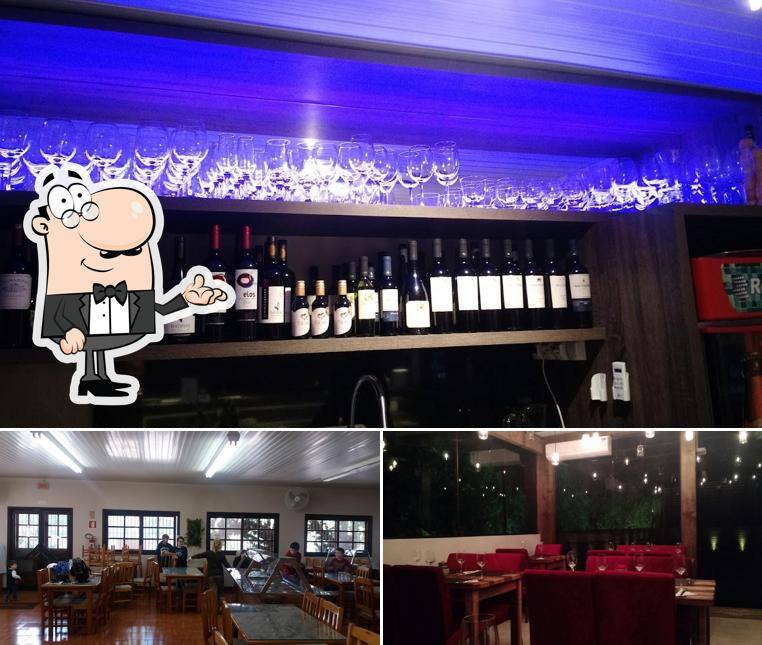 Sente em uma das mesas no Gran Mangiar