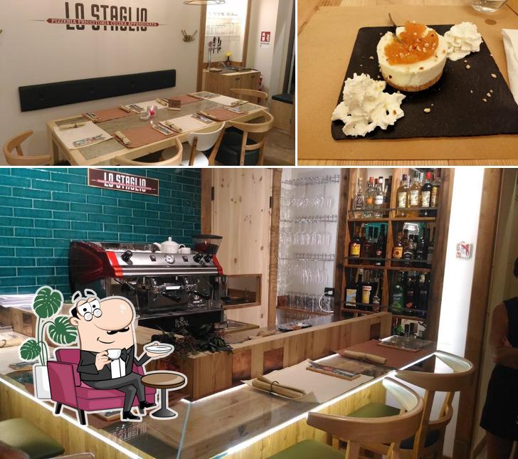 Dai un’occhiata alla foto che presenta la interni e cibo di Lo Staglio